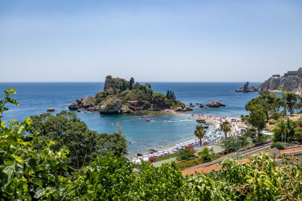 aerial-view-of-isola-bella-island-and-beach-taor-2022-04-19-01-11-38-utc