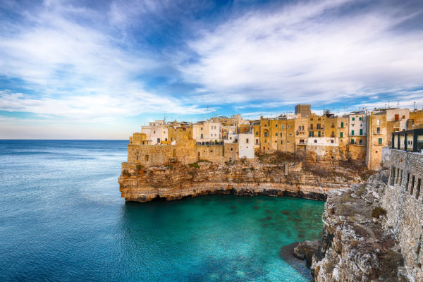 polignano-a-mare-village-on-the-rocks-at-sunset-2021-08-30-00-58-44-utc