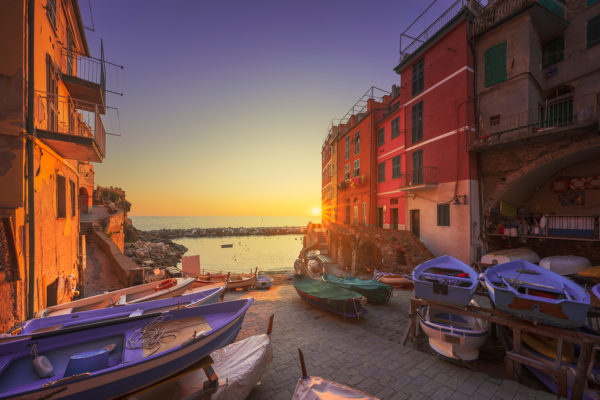 riomaggiore-village-street-boats-and-sea-at-sunse-2022-02-03-00-19-29-utc