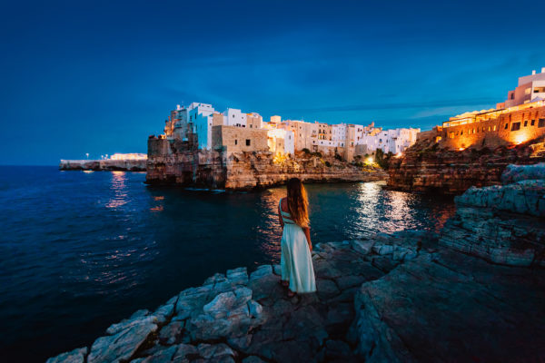 young-woman-on-the-rocks-in-front-of-the-apulian-v-2021-11-06-17-40-29-utc